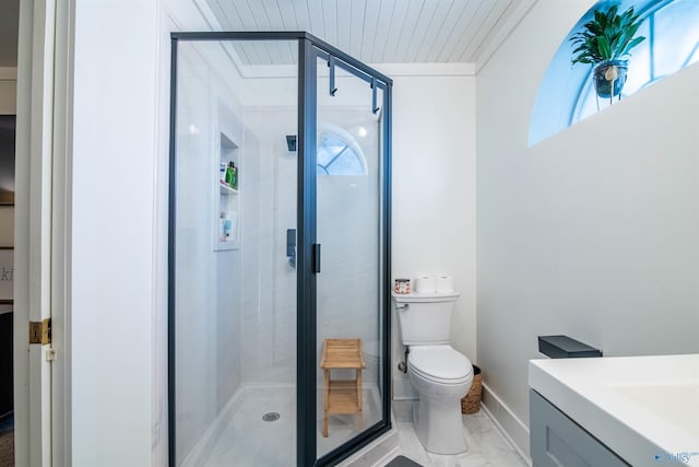 bathroom with toilet, a shower stall, and vanity