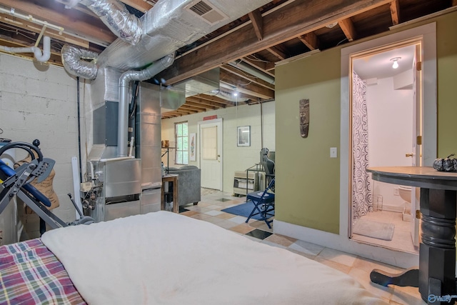 basement with tile patterned floors