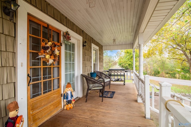 wooden deck with a porch