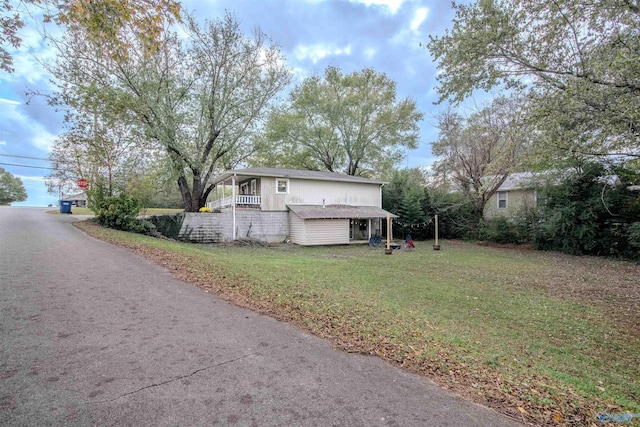 exterior space with a yard