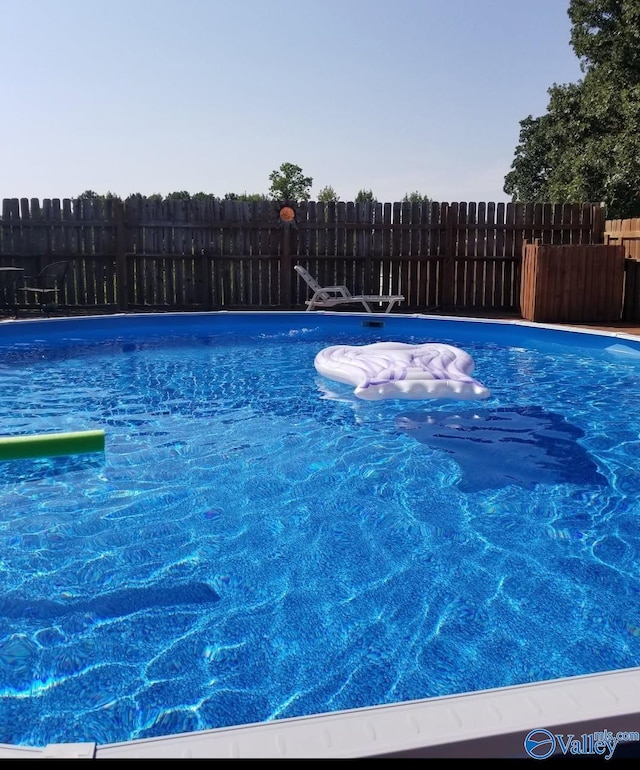 pool featuring fence