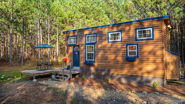 exterior space featuring a wooden deck