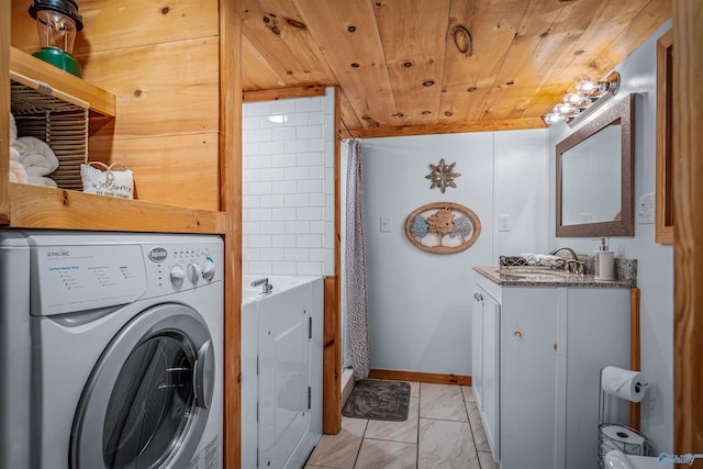 laundry area with washer / dryer, wooden ceiling, sink, and light tile patterned floors