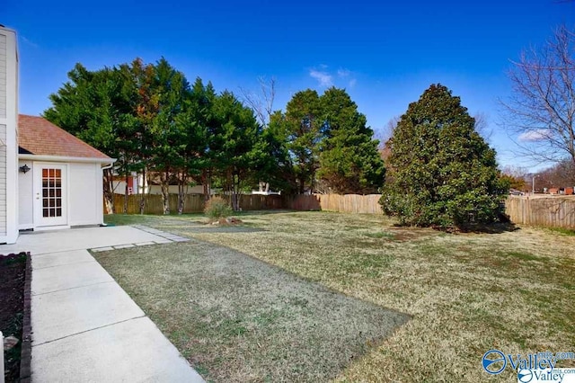 view of yard featuring a patio and a fenced backyard