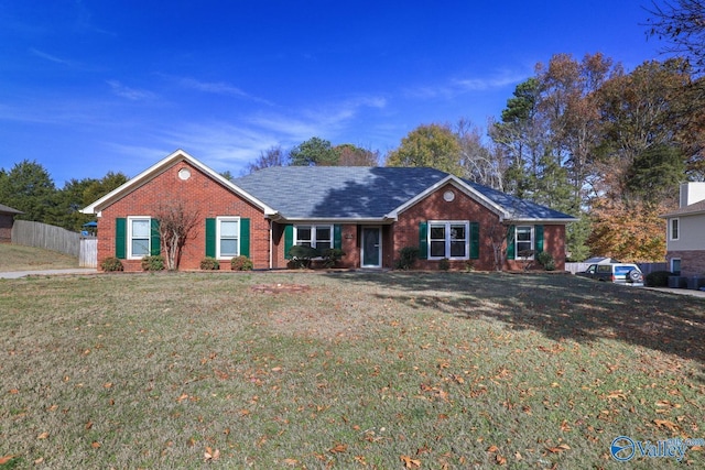 single story home with a front yard