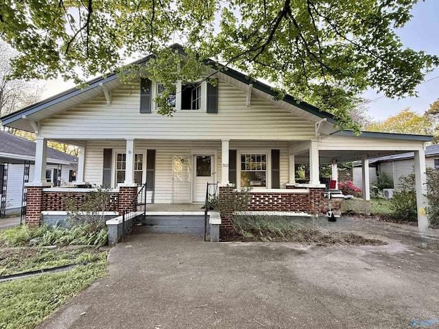 2103 Lee High Dr NE, Huntsville, AL 35811 - craftsman inspired home with a porch and an attached carport