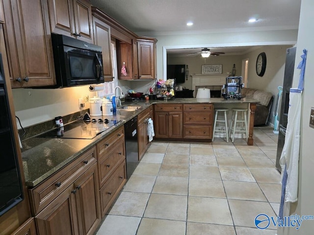 kitchen with light tile patterned floors, black appliances, crown molding, ceiling fan, and sink