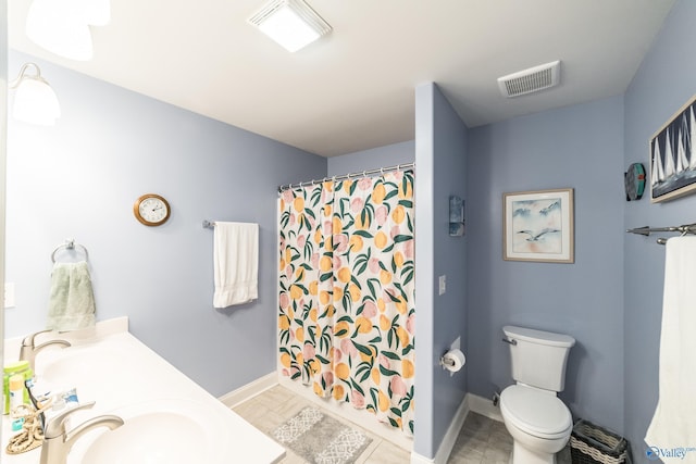bathroom with visible vents, a sink, and toilet
