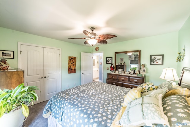 carpeted bedroom featuring ceiling fan and a closet