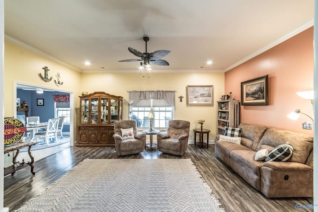living area with crown molding, a ceiling fan, recessed lighting, and wood finished floors