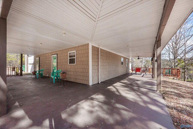 view of patio / terrace featuring a carport