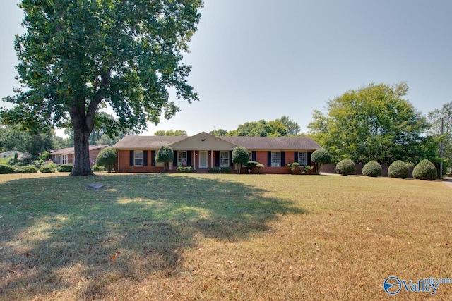 ranch-style house with a front yard