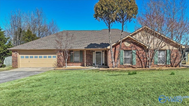 single story home with an attached garage, driveway, a front lawn, and brick siding