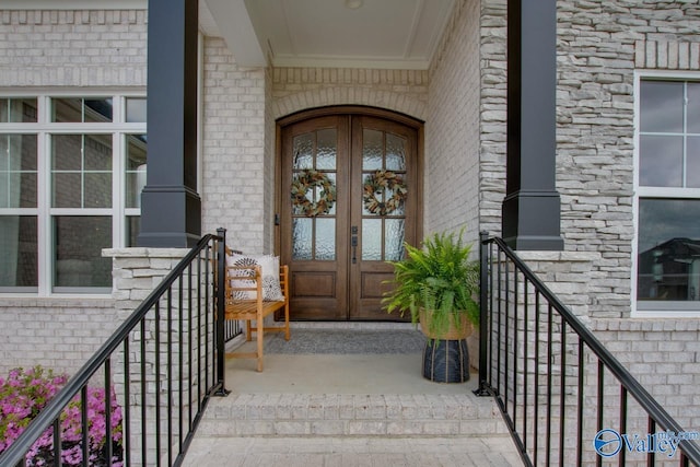 8076 Goose Ridge Dr, Owens Cross Roads, AL 35763 - entrance to property featuring french doors and brick siding