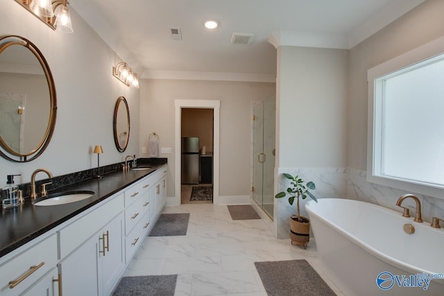 8076 Goose Ridge Dr, Owens Cross Roads, AL 35763 - full bathroom with marble finish flooring, double vanity, a soaking tub, a stall shower, and recessed lighting