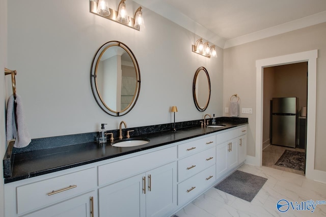 8076 Goose Ridge Dr, Owens Cross Roads, AL 35763 - bathroom featuring marble finish flooring and double vanity