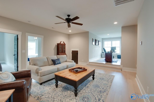 8076 Goose Ridge Dr, Owens Cross Roads, AL 35763 - living area featuring a ceiling fan, light wood finished floors, recessed lighting, and baseboards