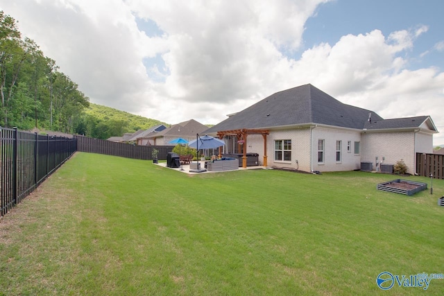 8076 Goose Ridge Dr, Owens Cross Roads, AL 35763 - rear view of property featuring a patio area, brick siding, cooling unit, and a pergola