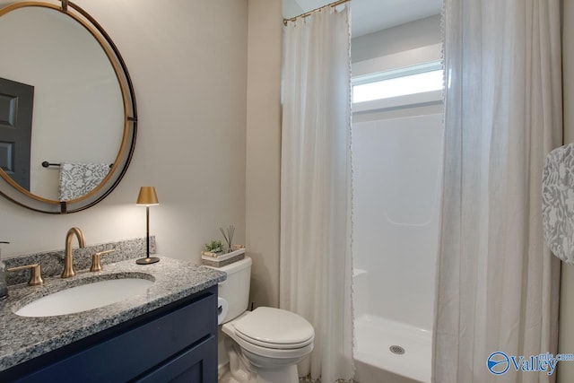 8076 Goose Ridge Dr, Owens Cross Roads, AL 35763 - bathroom with toilet, vanity, and curtained shower