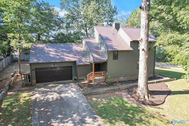 view of front of property with a garage