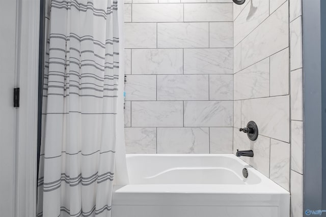 bathroom with shower / bath combo