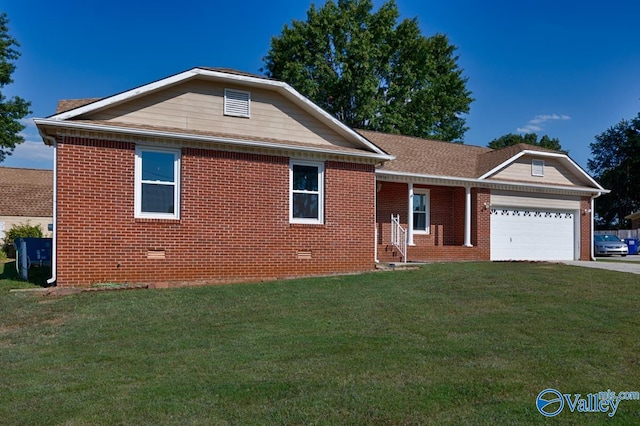 view of front of house featuring a garage and a front lawn