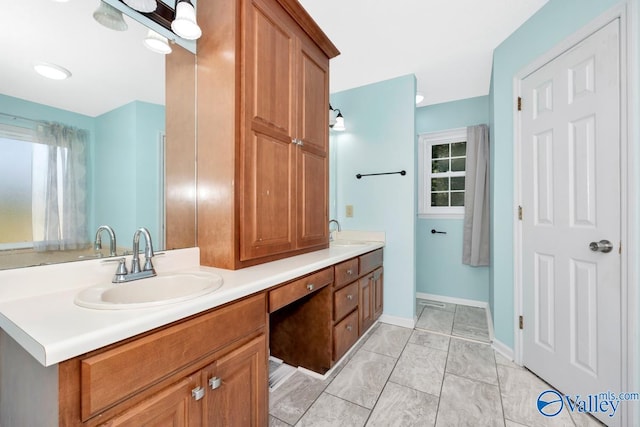 bathroom featuring tile patterned floors and vanity