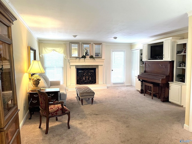 living room with light carpet, baseboards, a fireplace with raised hearth, and crown molding