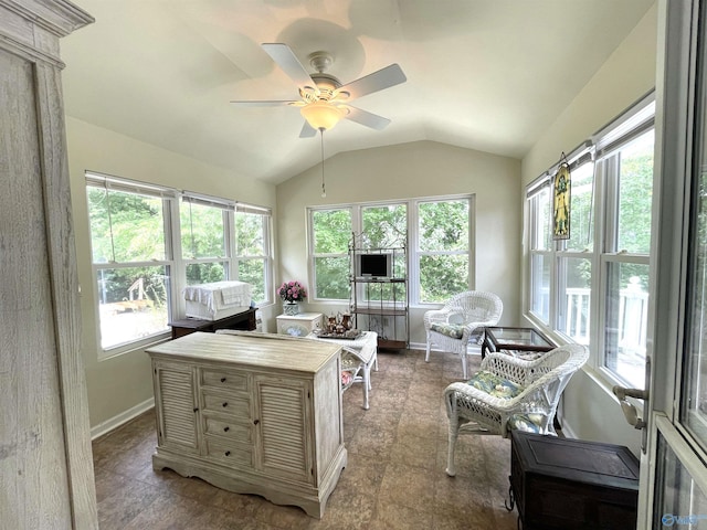 sunroom with vaulted ceiling and ceiling fan