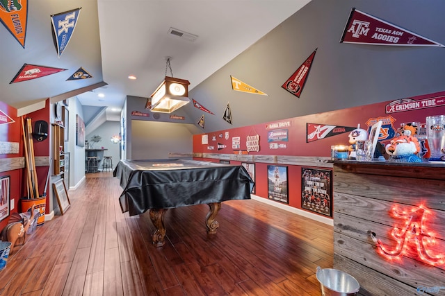 recreation room with hardwood / wood-style floors, lofted ceiling, and pool table