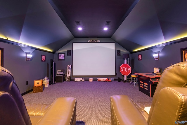 carpeted cinema with vaulted ceiling