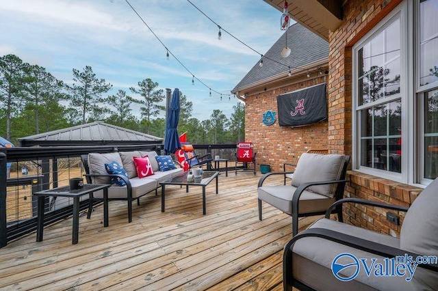 wooden deck with outdoor lounge area