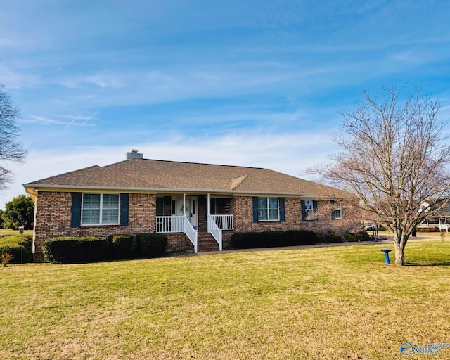 single story home featuring a front yard and a porch