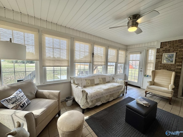 sunroom / solarium with ceiling fan