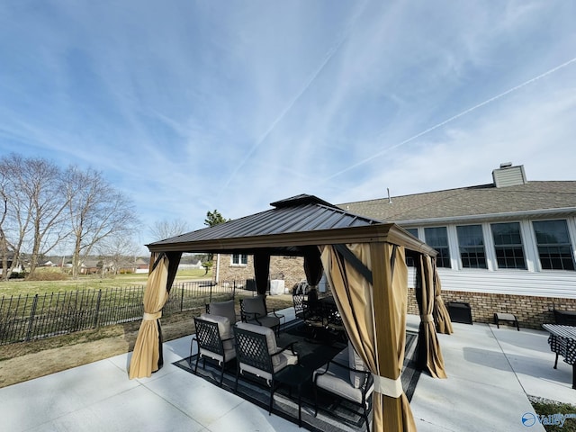 view of patio / terrace featuring an outdoor living space and a gazebo