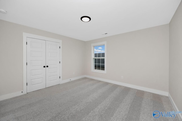 4 Sable Creek Ct, Gurley, AL 35748 - unfurnished bedroom featuring baseboards, carpet flooring, visible vents, and a closet
