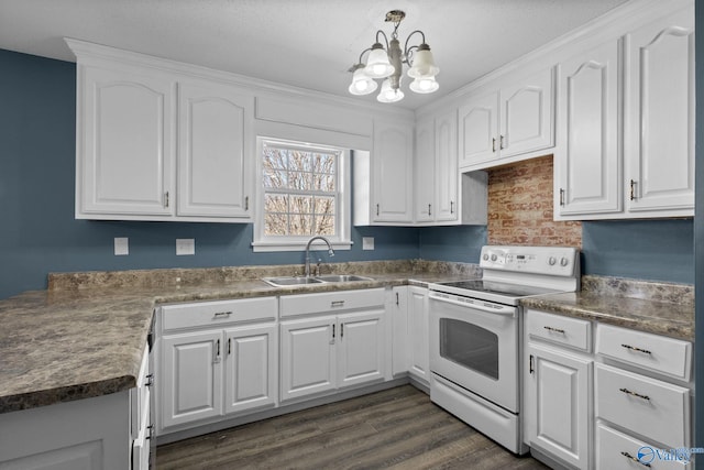 kitchen with white range with electric cooktop, white cabinets, dark countertops, dark wood-style floors, and a sink