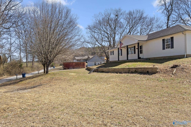 exterior space with a yard