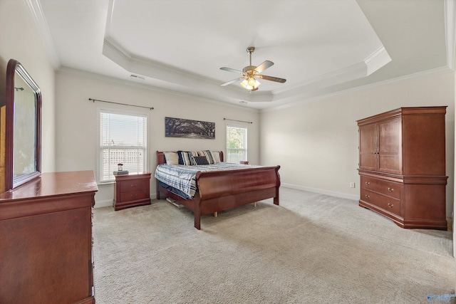 105 Cherrywood Dr, Madison, AL 35756 - bedroom featuring a tray ceiling, crown molding, light carpet, and a ceiling fan