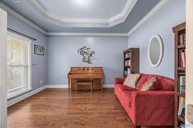 105 Cherrywood Dr, Madison, AL 35756 - living area featuring a raised ceiling, wood finished floors, and crown molding