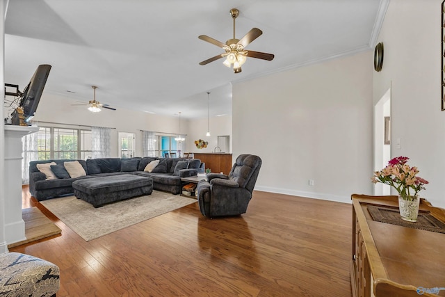 105 Cherrywood Dr, Madison, AL 35756 - living area with a ceiling fan, wood finished floors, and crown molding