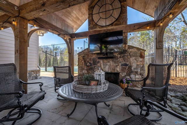 view of patio / terrace featuring fence