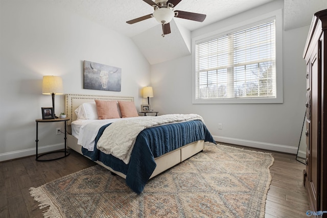 bedroom featuring wood-type flooring, baseboards, and vaulted ceiling