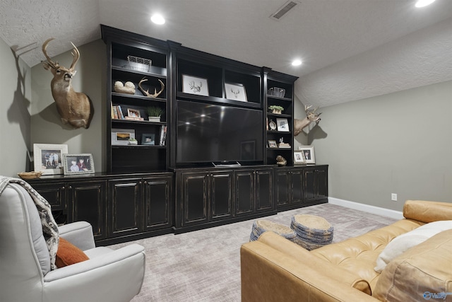 carpeted living room with vaulted ceiling, recessed lighting, baseboards, and visible vents