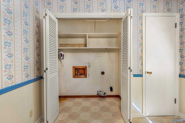 clothes washing area with laundry area, wallpapered walls, tile patterned floors, hookup for a washing machine, and hookup for an electric dryer