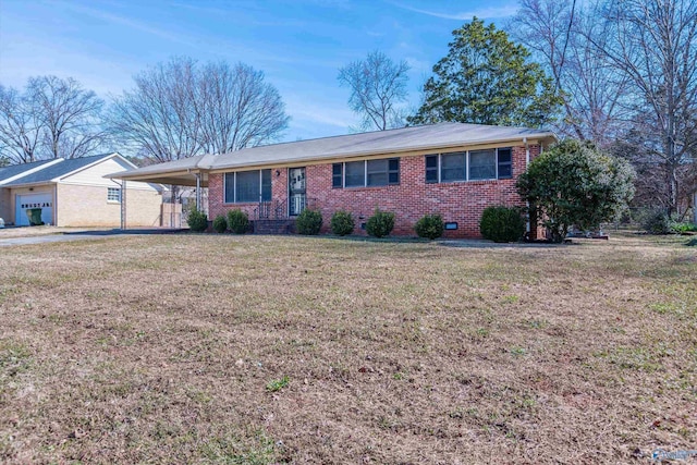 single story home with an attached carport, crawl space, a front yard, and brick siding