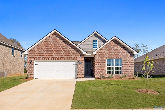 view of front of home featuring central AC, a garage, and a front yard