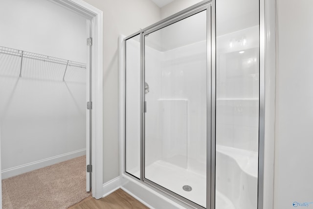 bathroom with an enclosed shower