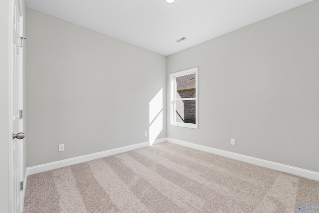 spare room with carpet flooring