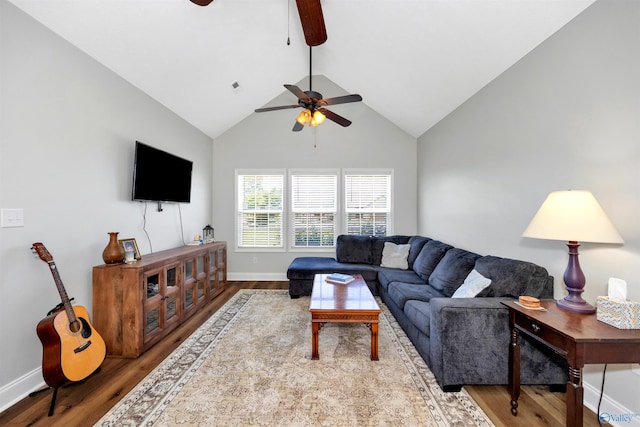 16290 Log Cabin Rd, Athens, AL 35611 - living room with a ceiling fan, wood finished floors, baseboards, and vaulted ceiling